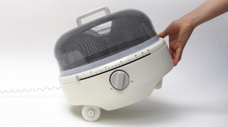 Illustration for article titled This Compact Microwave Is a Must-Have For Your Car